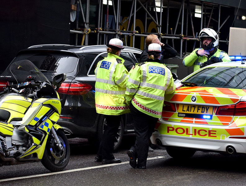 A group of police using e-forms and mobility software